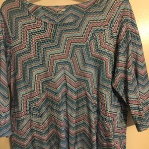 Tunic top.  Zigzag pattern on light blue background.  2x